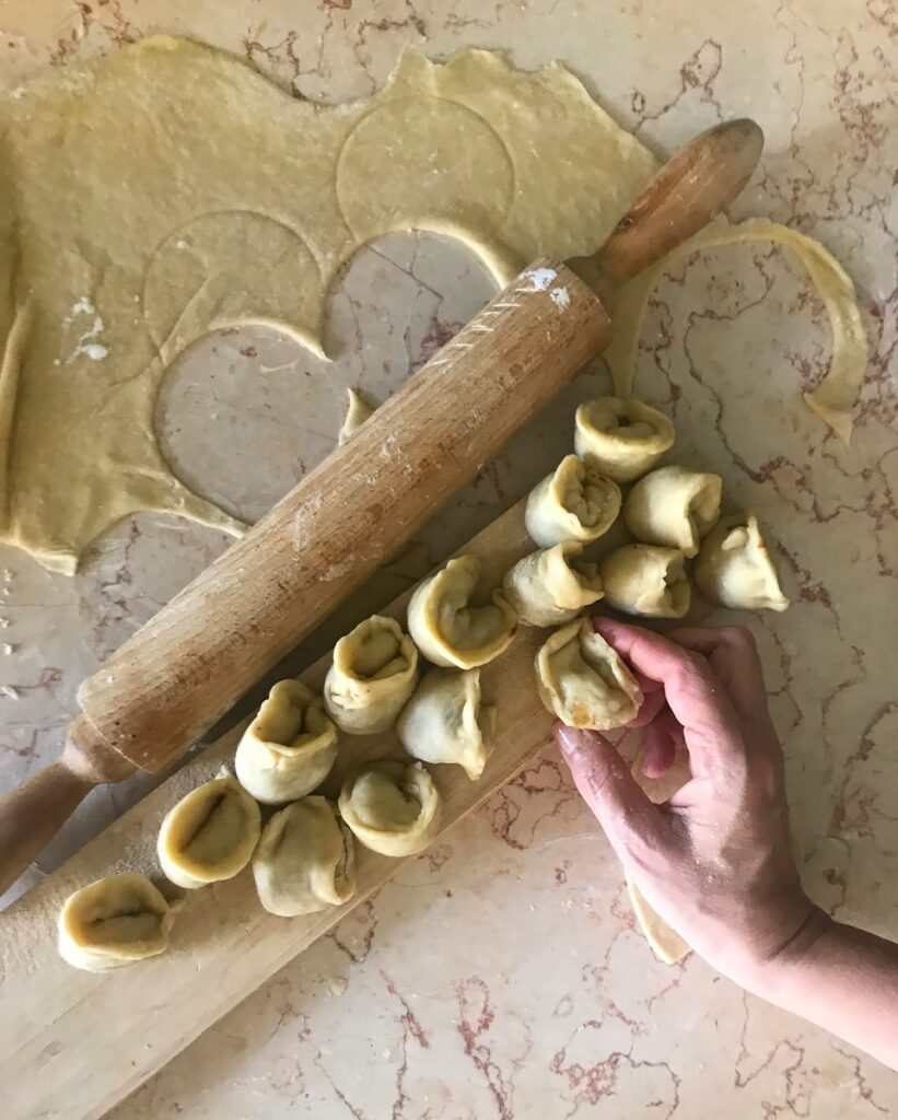stuffed dough and rolling pin